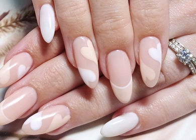 Stylish nail art with soft pink designs by Beauty by Nadia in Pretoria, Gauteng, ZA.
