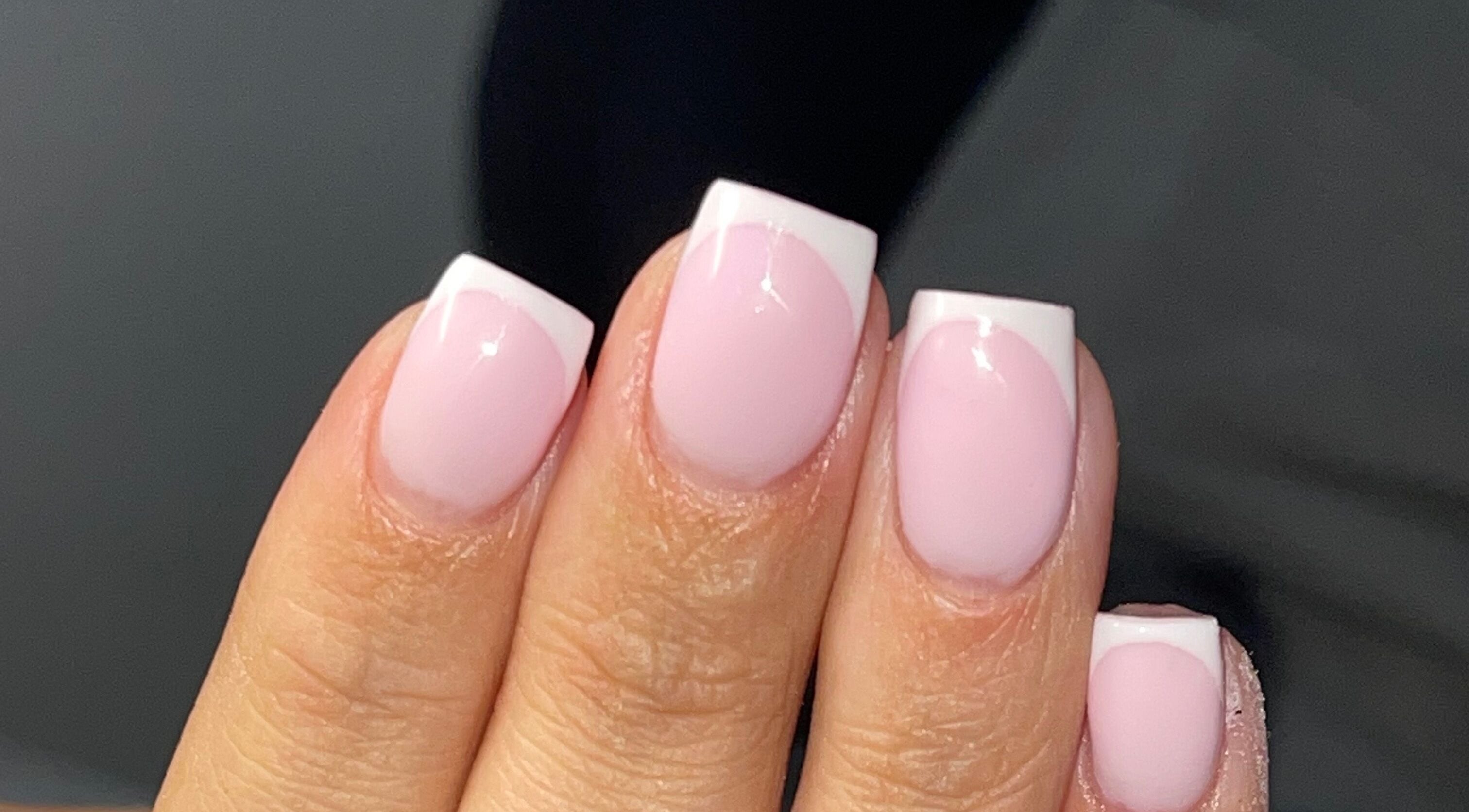 Elegant French manicure at Beauty by Nicolexo, Corby, England, GB, showcasing pink and white nail art.