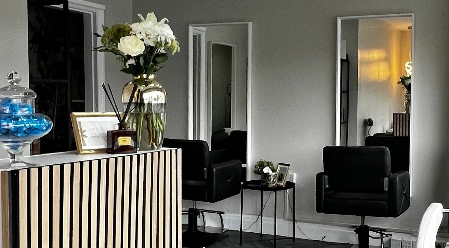 Elegant salon seating and decor at Bombshell Beauty Lounge, Stockport, England, GB.