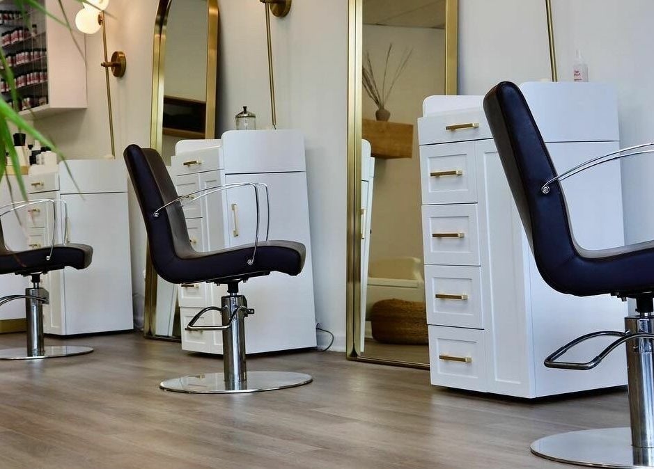 Modern salon interior with sleek chairs at Roots Radicals North, Brewster, New York, US.