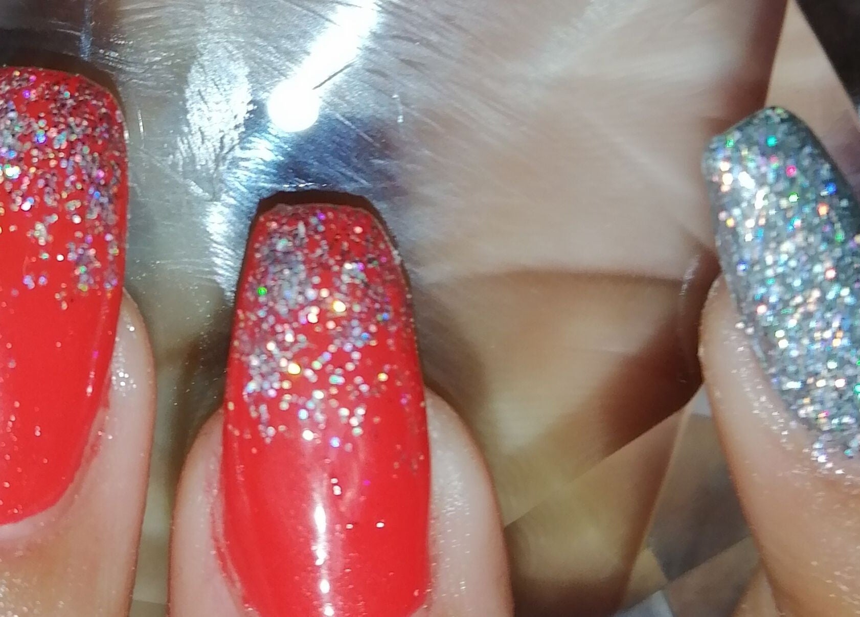 Glittery red and silver nails at Nailed It Nerize in Pretoria, Gauteng, ZA.