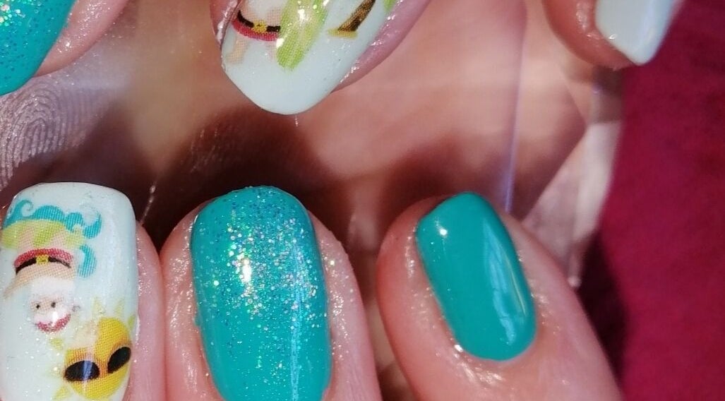 Bright turquoise nails with fun designs at Nailed It Nerize, Pretoria, Gauteng, ZA.