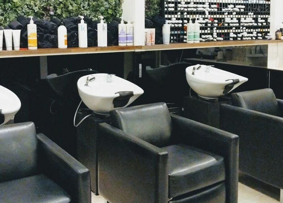 Luxury wash stations at Preen salon, Melbourne, Victoria, AU, set with premium hair care products.