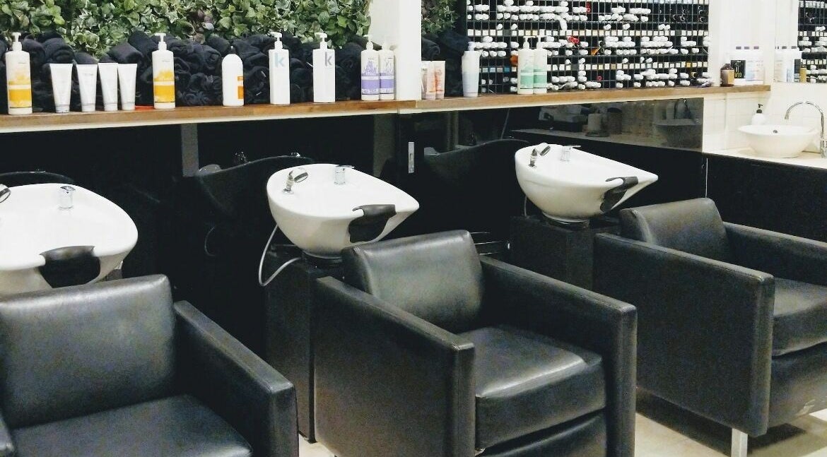 Luxury wash stations at Preen salon, Melbourne, Victoria, AU, set with premium hair care products.