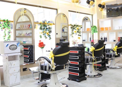 Stylish interior of The Masters Cut Tema in Tema, Greater Accra Region, GH featuring elegant salon chairs and decor.