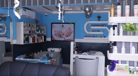 Relaxing interior of The Masters Cut North Kaneshie, Accra, showcasing elegant decor and products.