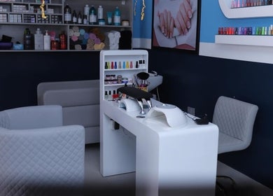 Cozy nail care station at The Masters Cut North Kaneshie, Accra, Greater Accra Region, GH with modern decor.
