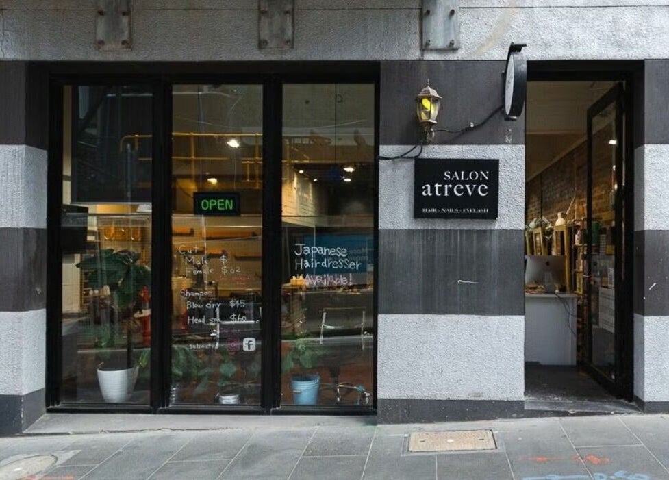Front view of Salon Atreve with an open sign, located in Melbourne, VIC, AU.