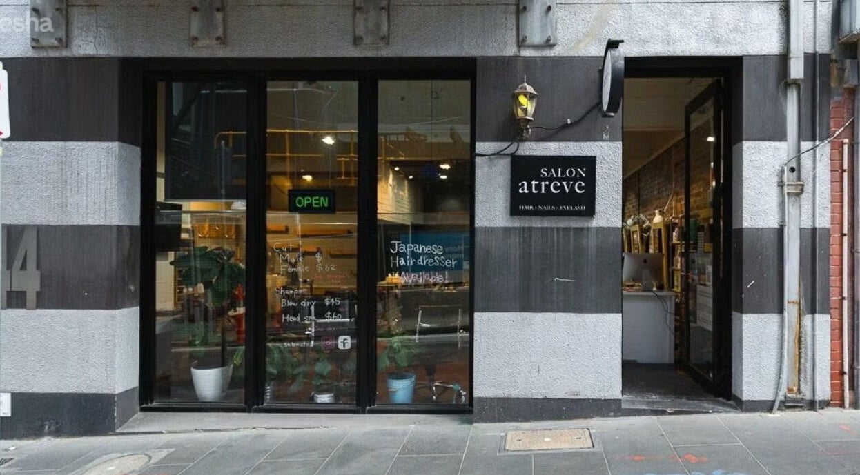 Front view of Salon Atreve with an open sign, located in Melbourne, VIC, AU.