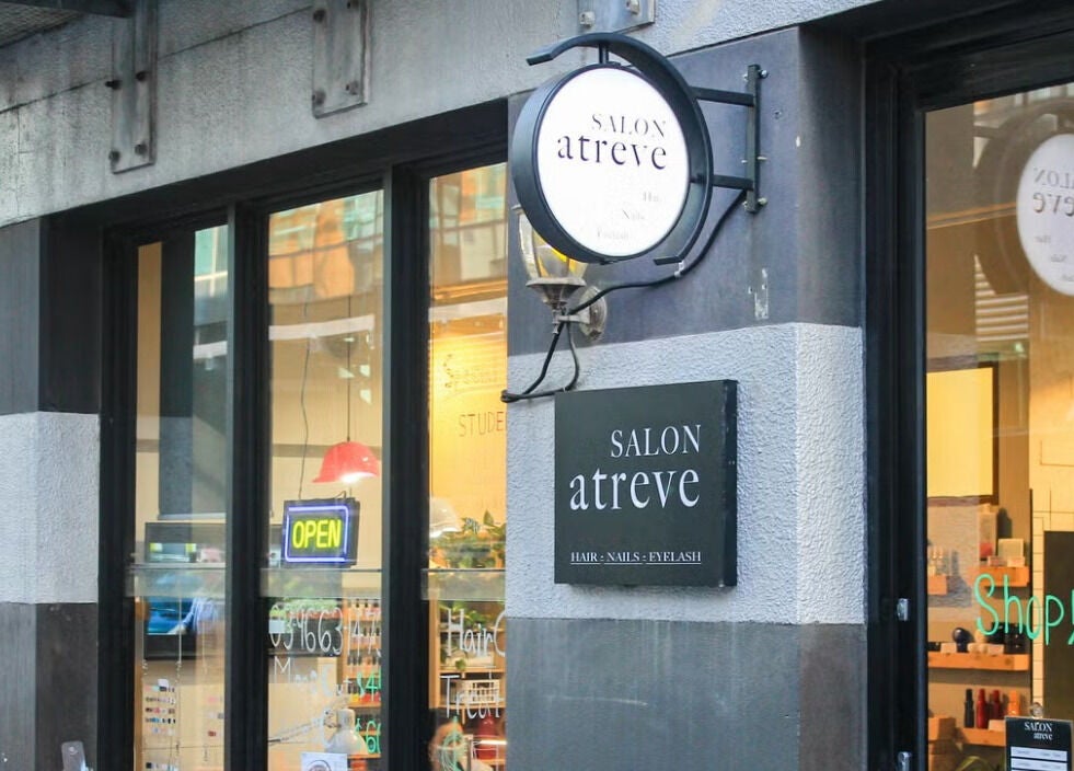 Exterior of Salon Atreve in Melbourne, VIC, AU, showcasing its inviting storefront and signage.