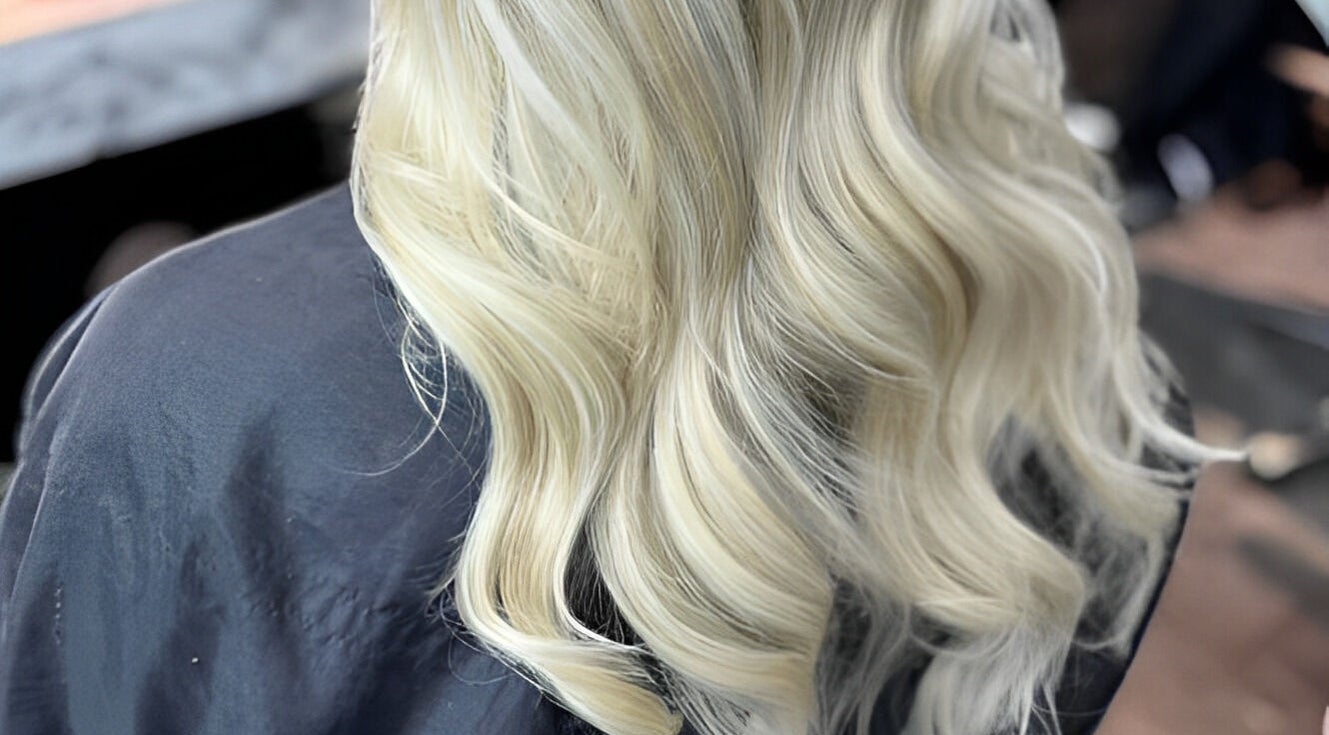 Blonde wavy hair styled at Serenity - Wishaw, located in Wishaw, Scotland, GB for a stunning look.