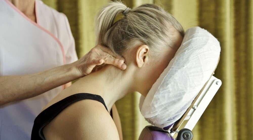 Relaxing neck massage at SERENITY BEAUTY AND WELLNESS, Wishaw, GB. Experience ultimate relaxation.