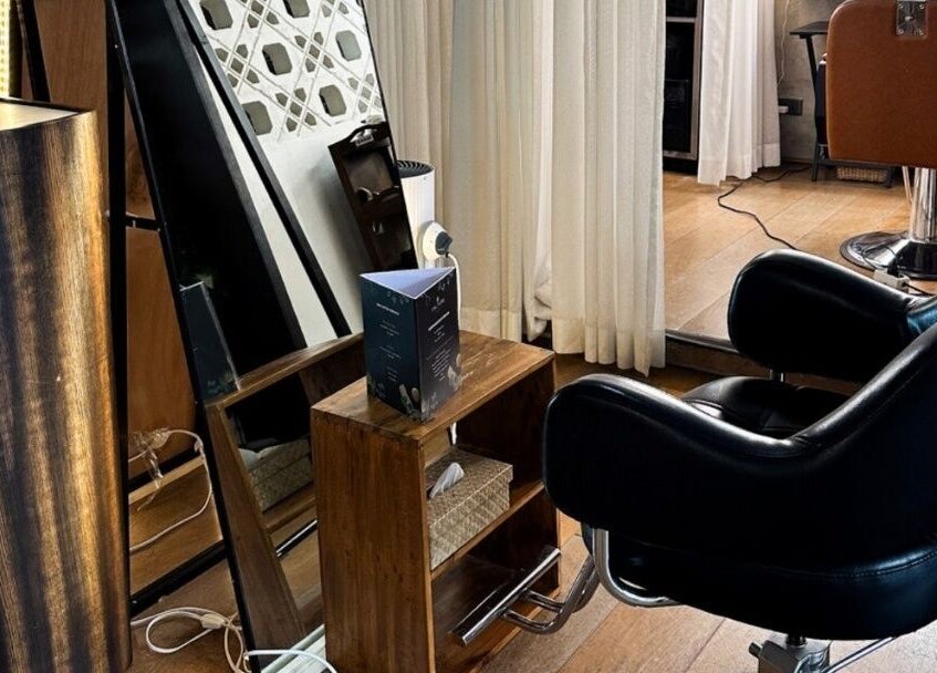 Chic salon interior at Culture Salon MNL in Taguig, Metro Manila, PH featuring sleek chairs and decor.