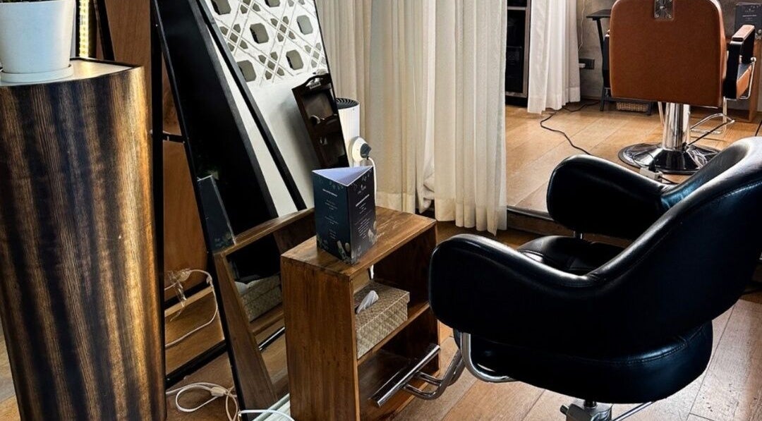 Chic salon interior at Culture Salon MNL in Taguig, Metro Manila, PH featuring sleek chairs and decor.