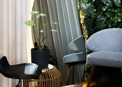 Stylish seating and green decor at Culture Salon MNL in Taguig, Metro Manila, PH.