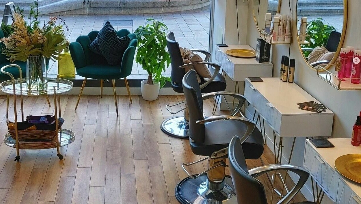 Mark Mardell salon interior with chic decor and styling chairs in Dartford, England, GB.
