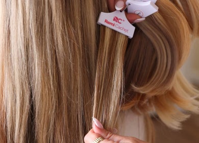Premium hair extensions at Athena by Sophia Olivia, Alderley Edge, England, GB enhance natural blonde hair.