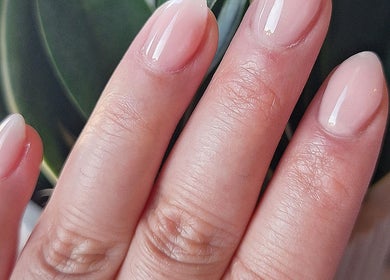 Beautiful manicured nails in soft pink at Nails Quoture, Glasgow, Scotland, GB.