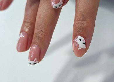 Elegant fox nail art at Nails Quoture in Glasgow, Scotland, GB showcasing trendy and intricate design.