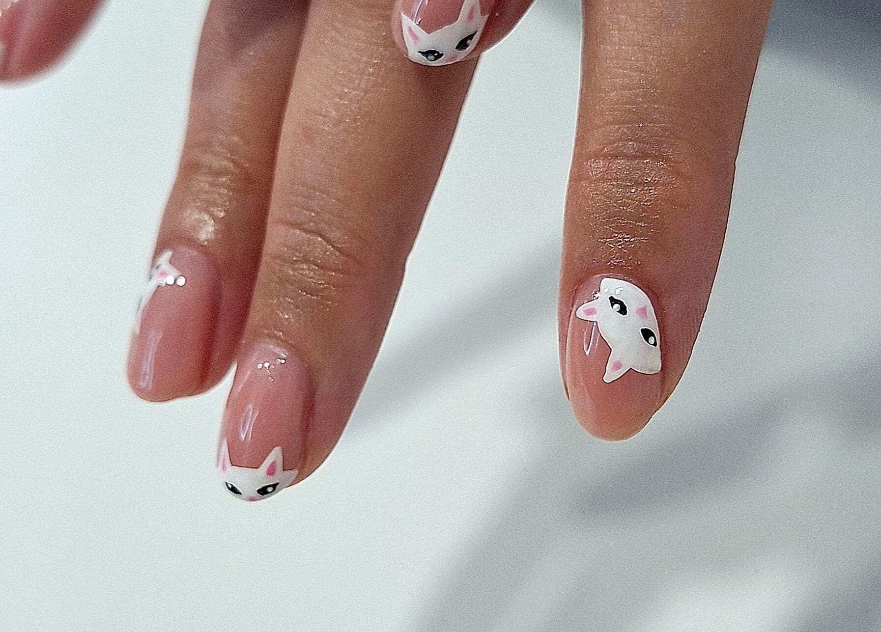 Cute cat nail designs at Nails Quoture, Glasgow, Scotland, GB.
