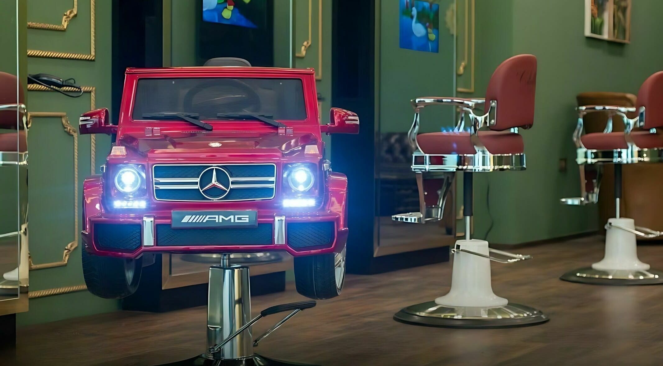 Red luxury car-themed chair at Cabello Lounge - Jumeirah Park, Dubai, Dubai, AE, enhances salon decor.
