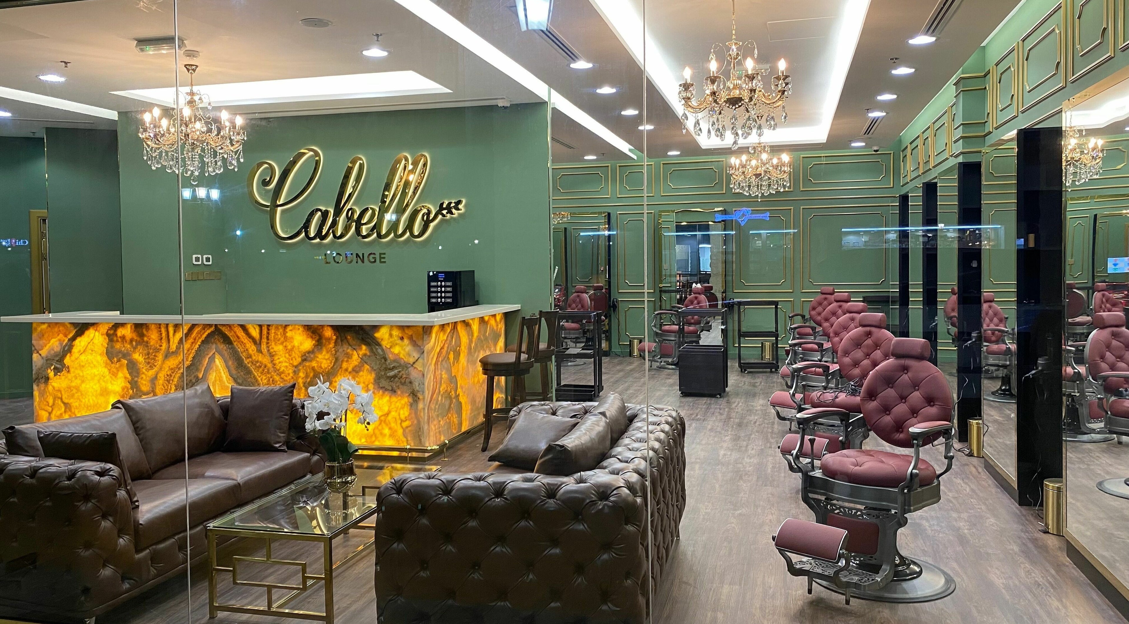 Interior of Cabello Lounge - Uptown Mirdif in Dubai, showcasing elegant decor and styling chairs.