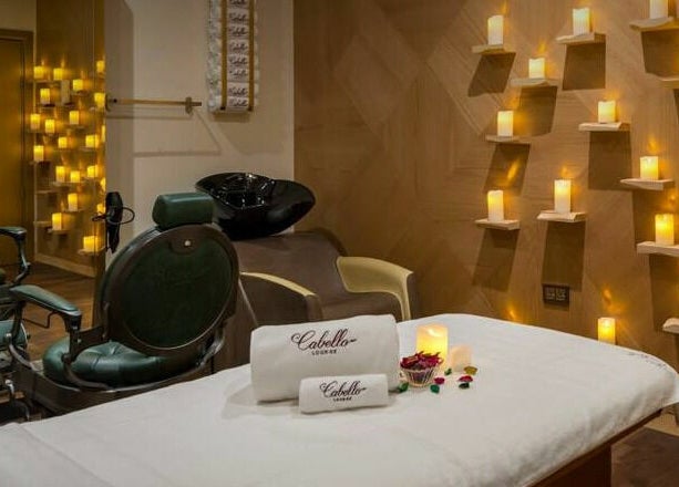 Tranquil spa setting with candles at Cabello Lounge - Uptown Mirdif, Dubai, Dubai, AE.
