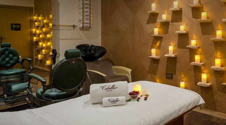 Tranquil spa setting with candles at Cabello Lounge - Uptown Mirdif, Dubai, Dubai, AE.