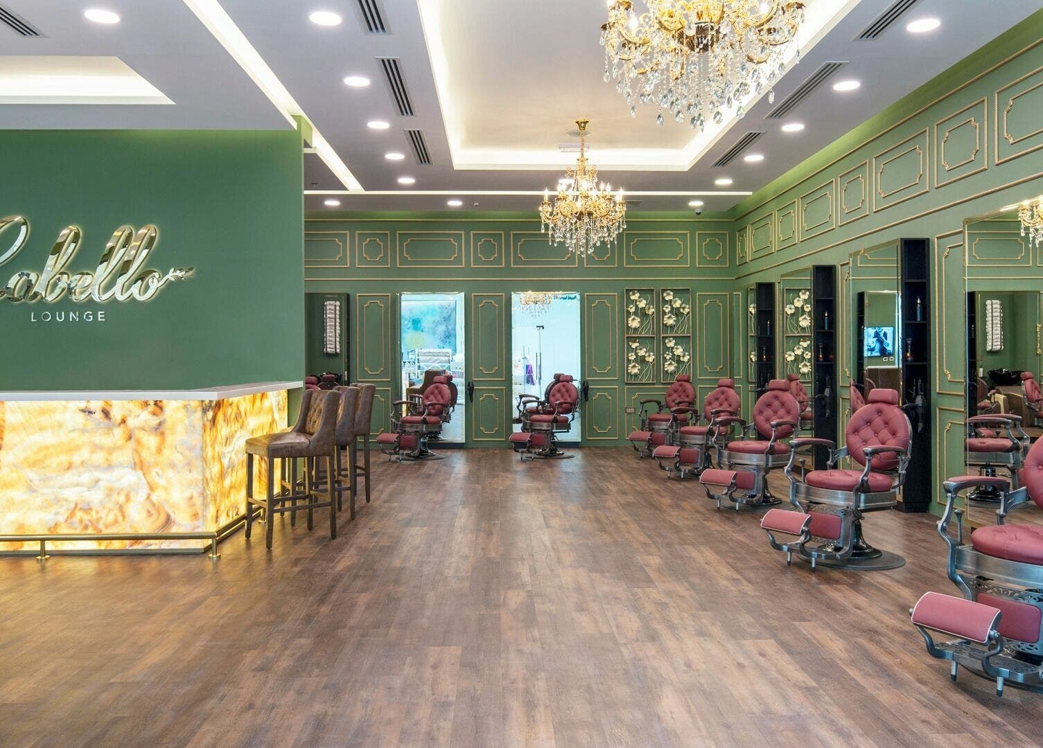 Luxurious interior of Cabello Lounge - Uptown Mirdif, Dubai, Dubai, AE, featuring chic salon chairs and chandeliers.