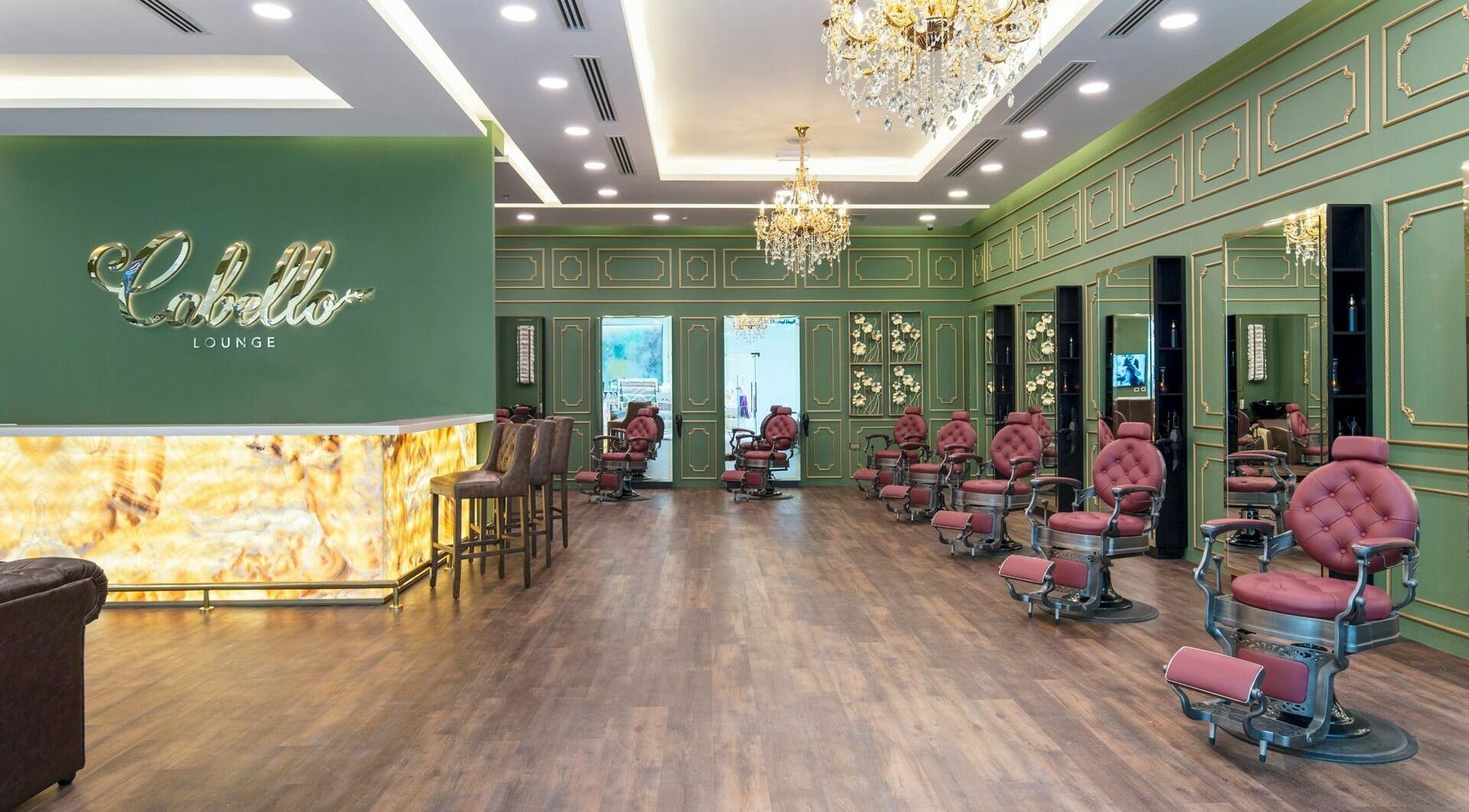 Luxurious interior of Cabello Lounge - Uptown Mirdif, Dubai, Dubai, AE, featuring chic salon chairs and chandeliers.
