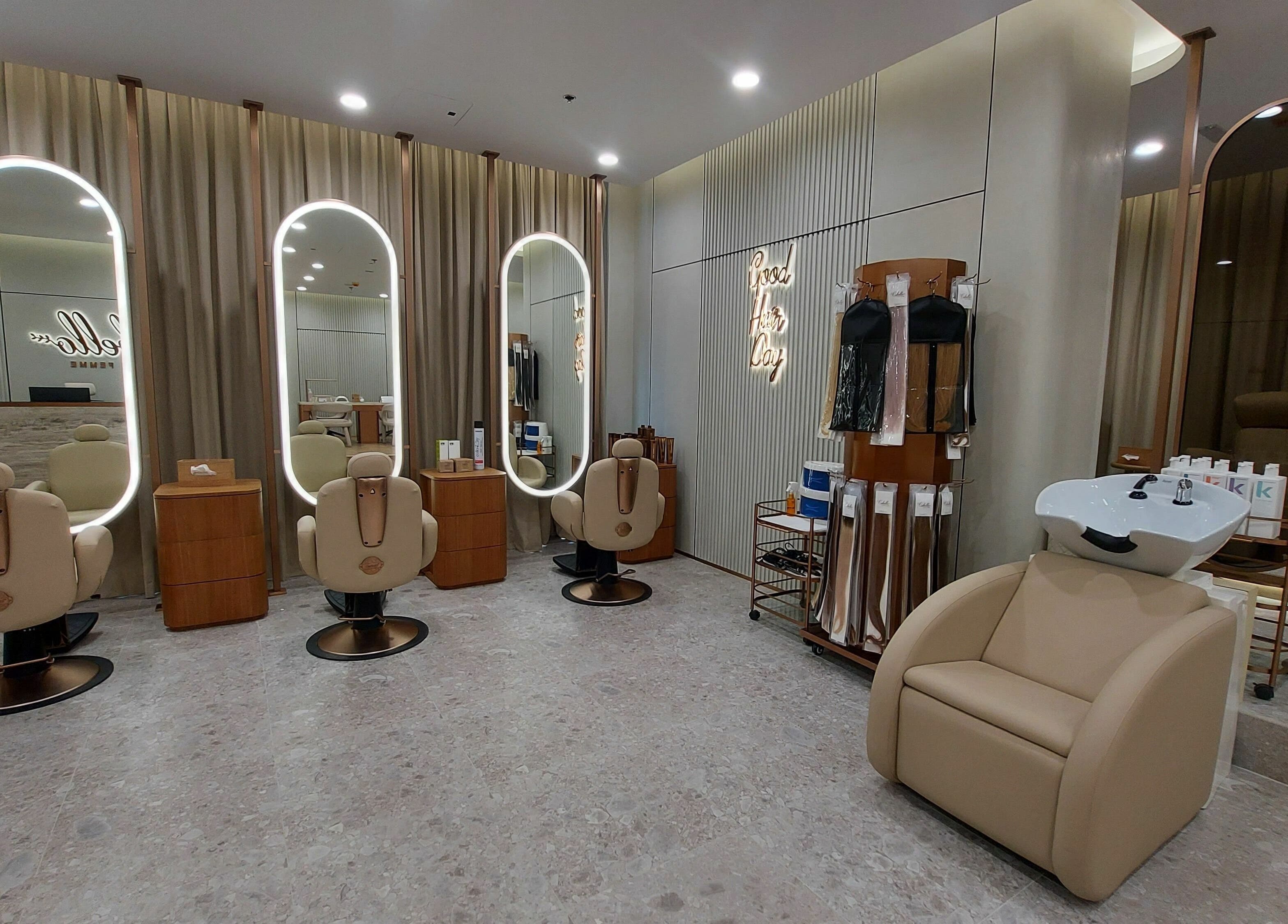 Modern salon interior at Cabello Lounge Femme Ladies Salon, Dubai, AE featuring stylish chairs and mirrors.