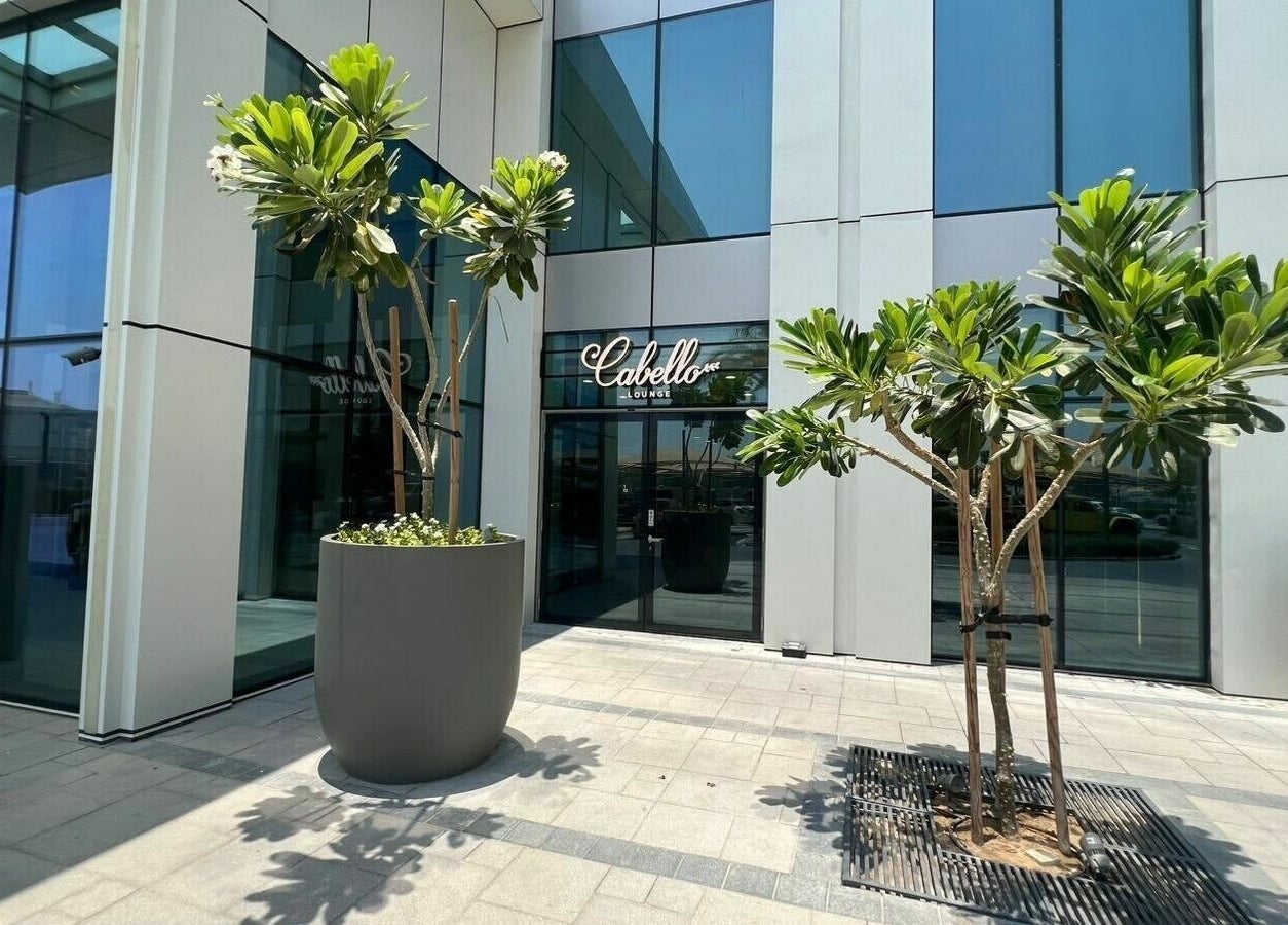 Exterior view of Cabello Lounge - Downtown Dubai, Dubai, Dubai, AE with lush greenery.
