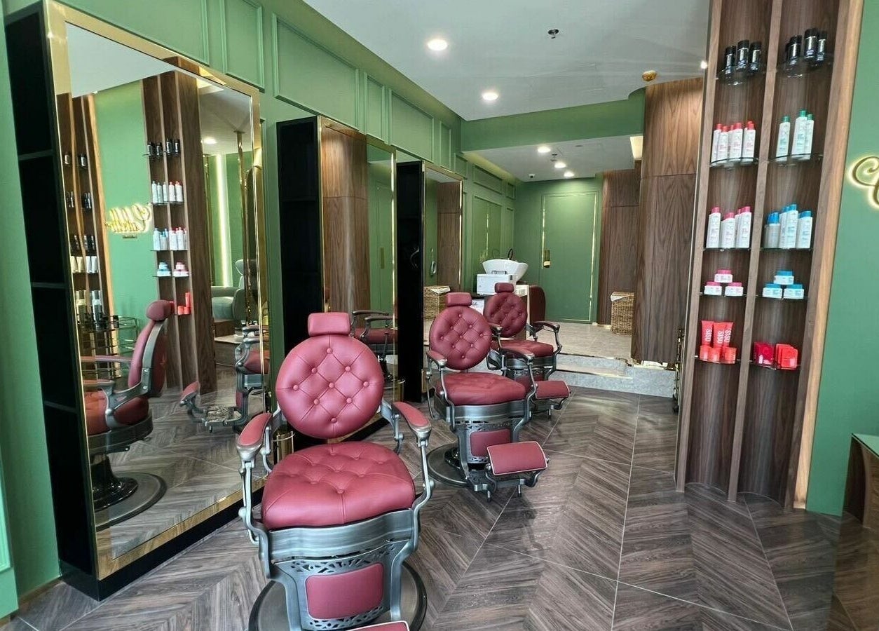 Chic interior of Cabello Lounge - Downtown Dubai, featuring stylish barber chairs in Dubai, Dubai, AE.