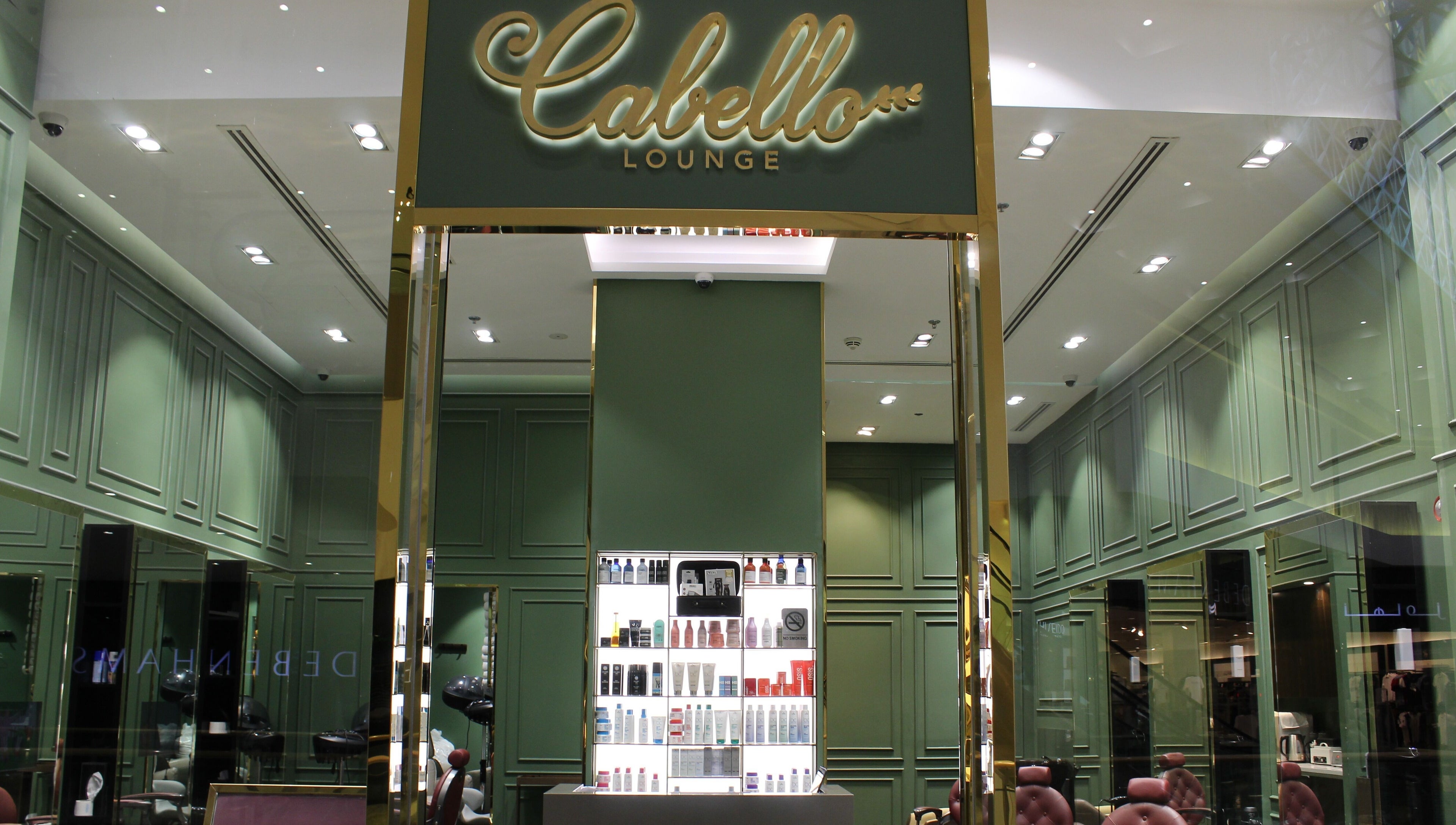 Interior of Cabello Lounge - City Centre Mirdif in Dubai, showcasing luxury design and beauty products.