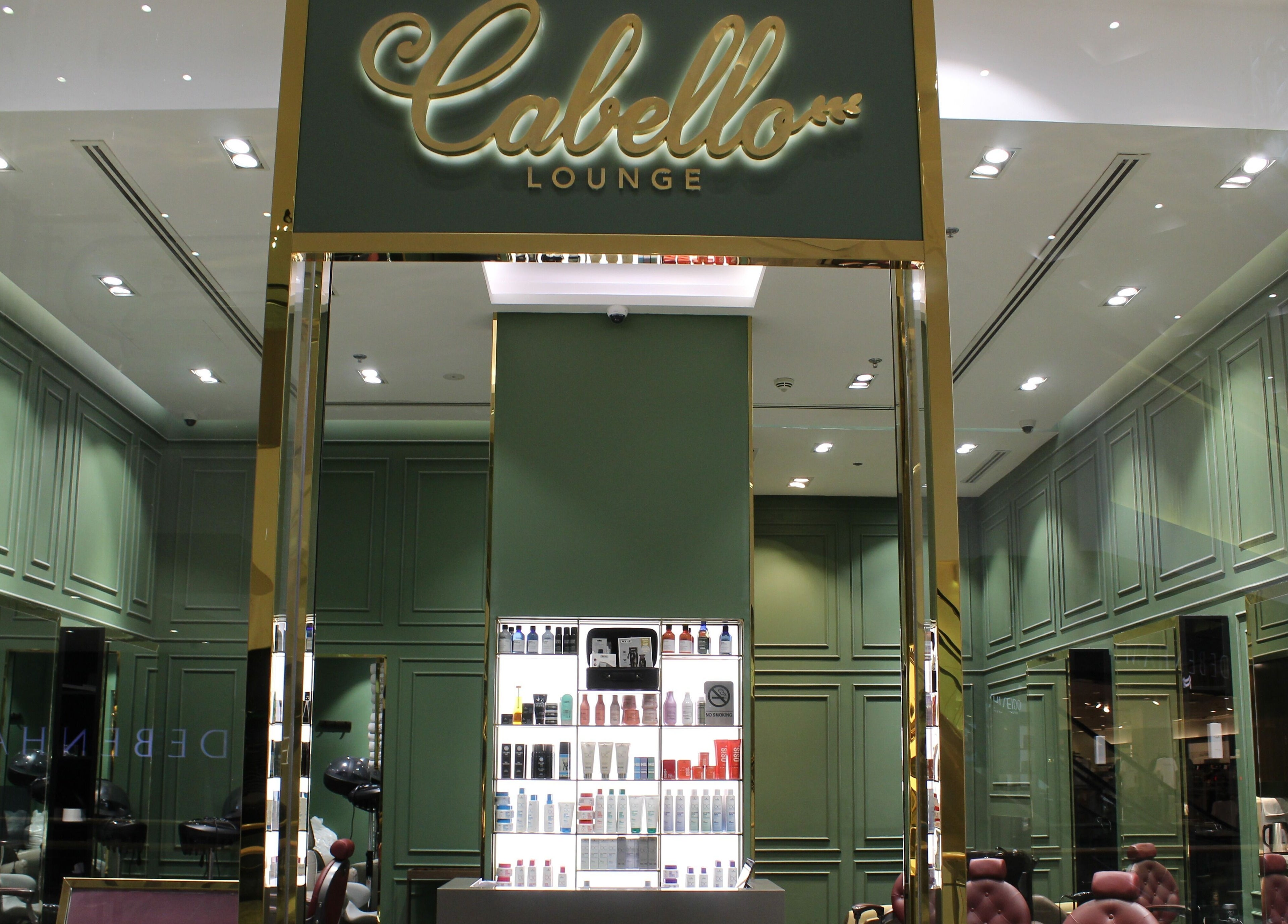 Interior of Cabello Lounge - City Centre Mirdif in Dubai, showcasing luxury design and beauty products.