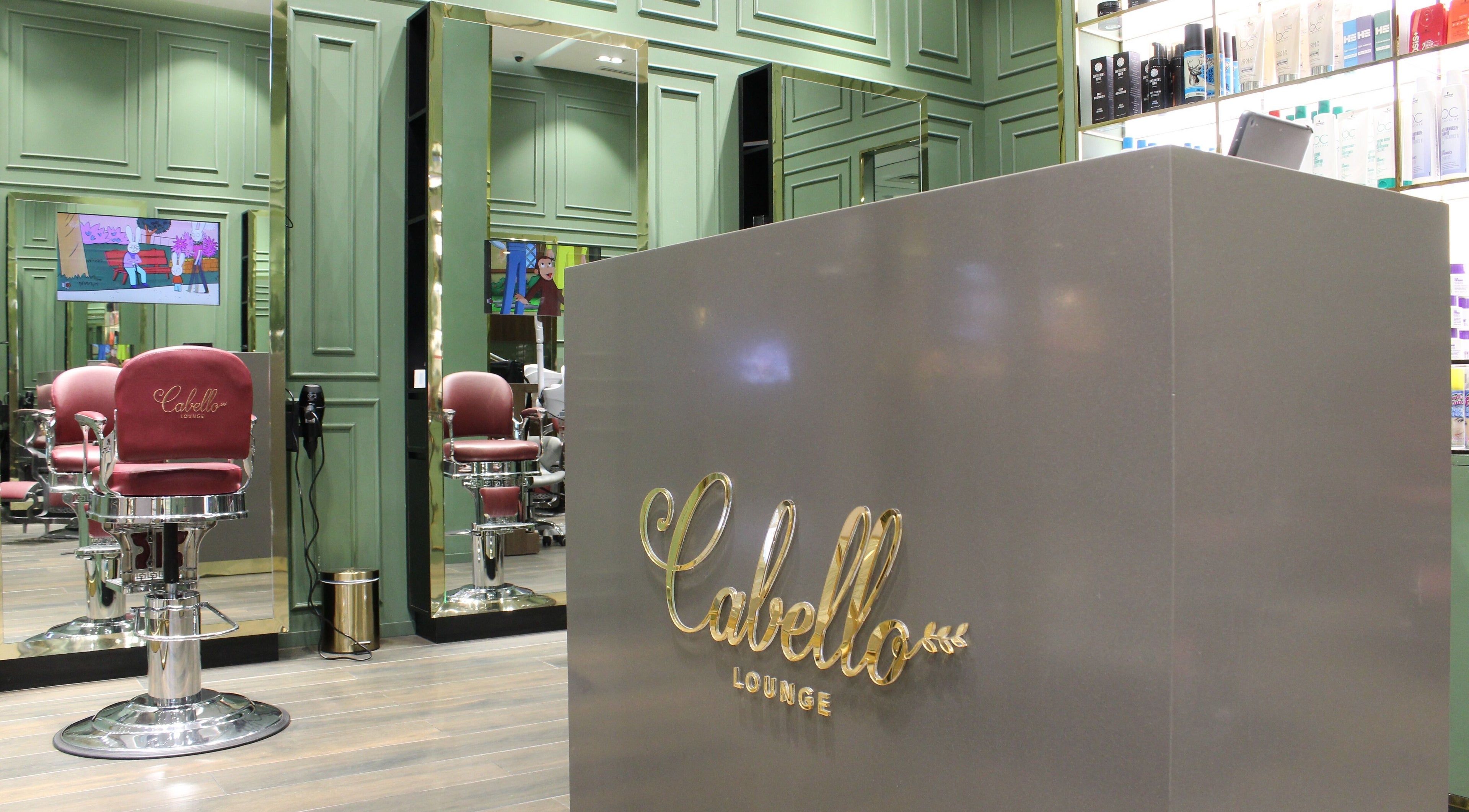 Reception area of Cabello Lounge - City Centre Mirdif in Dubai, Dubai, AE with chic decor and styling chairs.