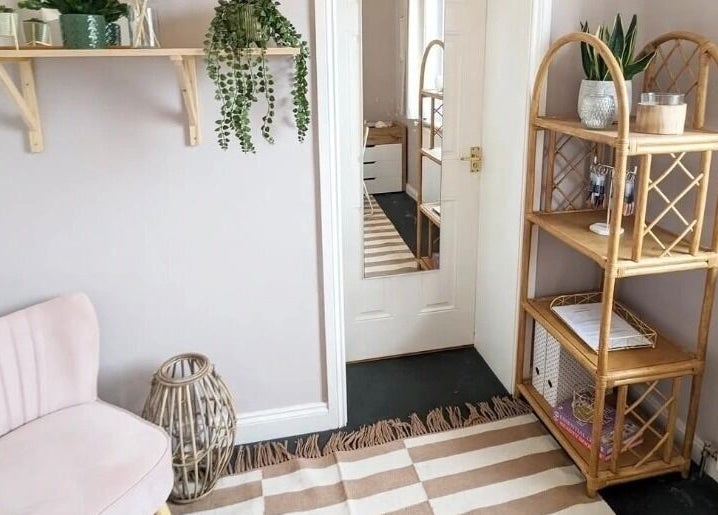 Relaxing interior of Nails by Hayley in Nairn, Scotland, GB featuring soft pink chair and natural decor.