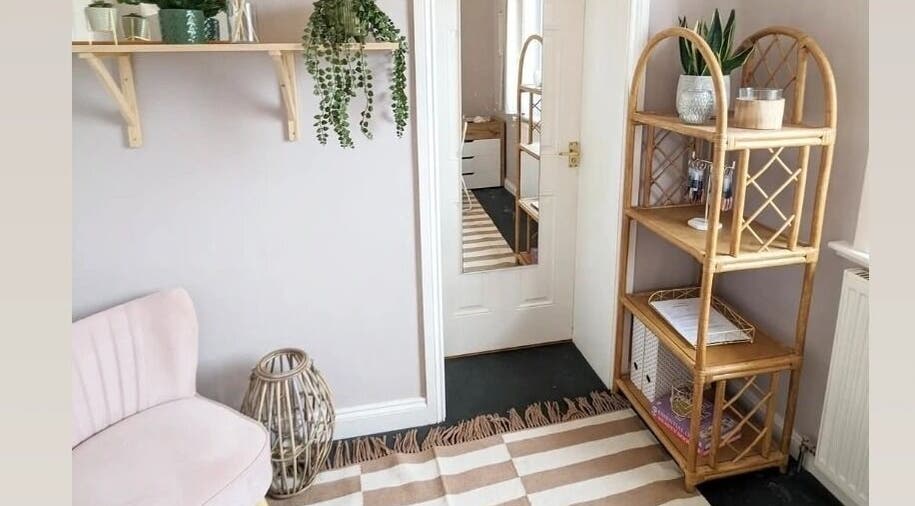 Relaxing interior of Nails by Hayley in Nairn, Scotland, GB featuring soft pink chair and natural decor.