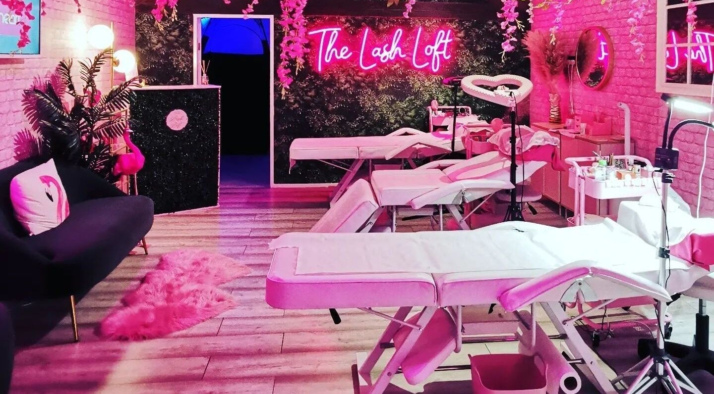Chic interior of The Lash Loft, Scarborough, England with pink decor and treatment beds.