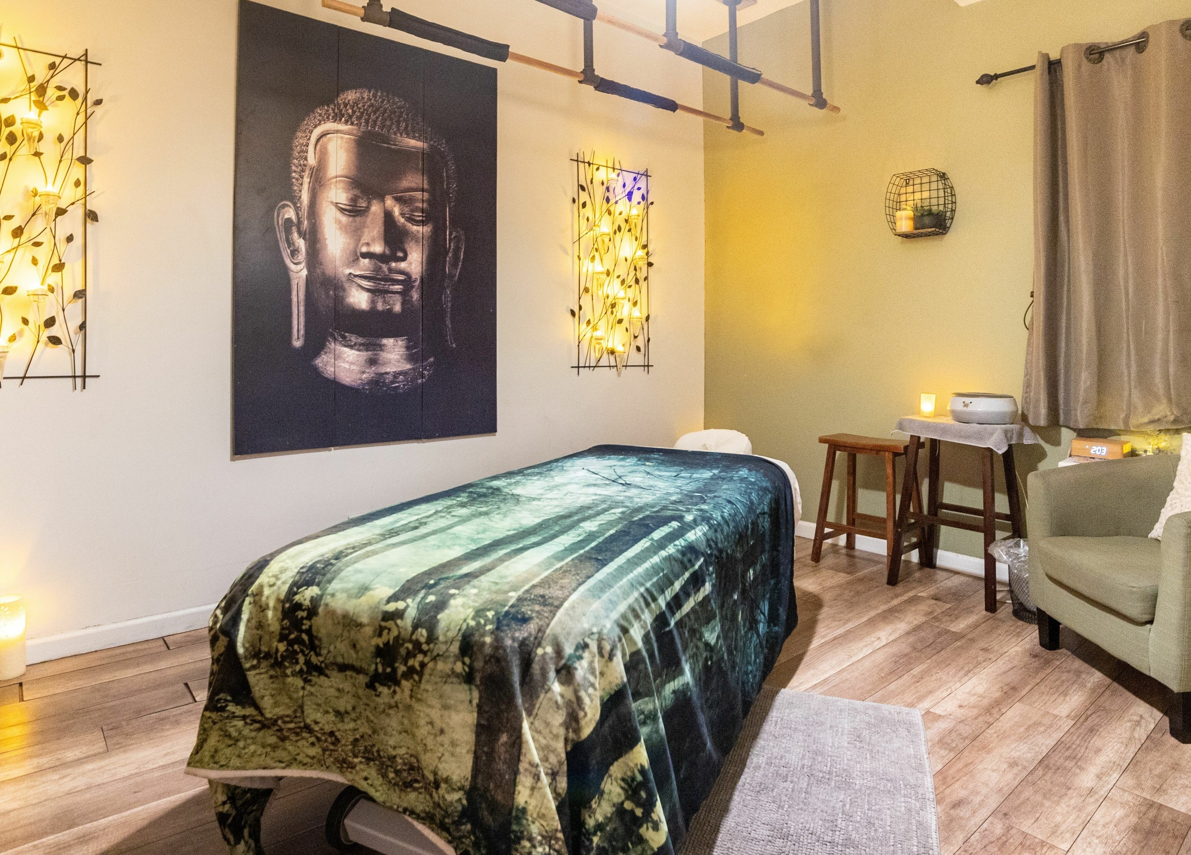 Relaxing treatment room at The MJ Treatment Spa and Wellness in New York, New York, US with calming decor.