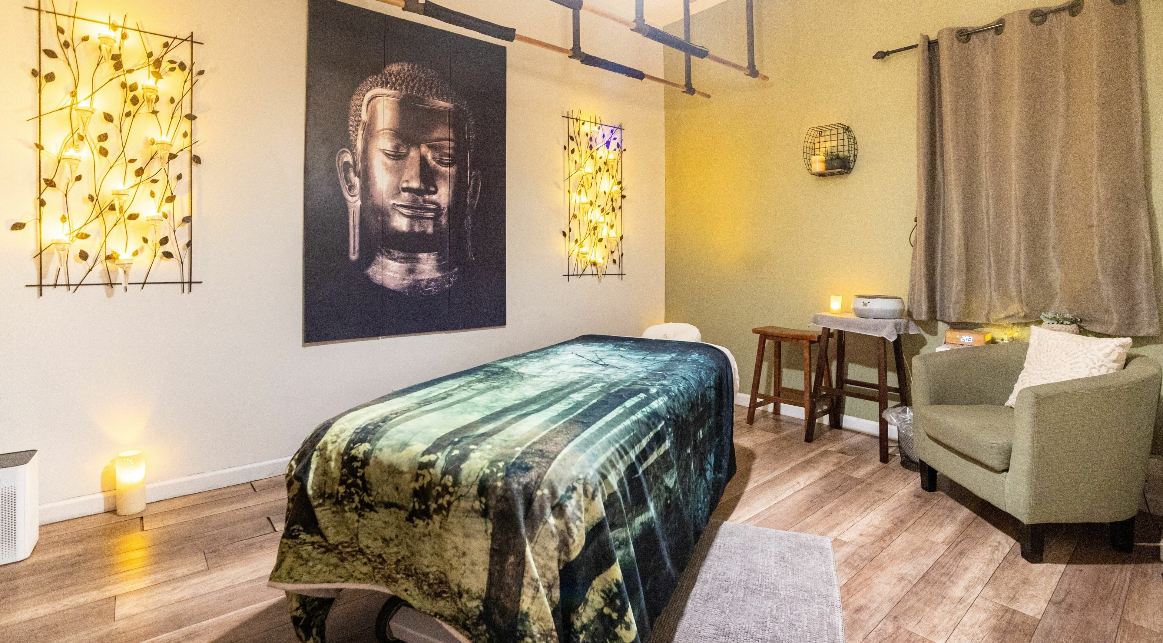 Relaxing treatment room at The MJ Treatment Spa and Wellness in New York, New York, US with calming decor.