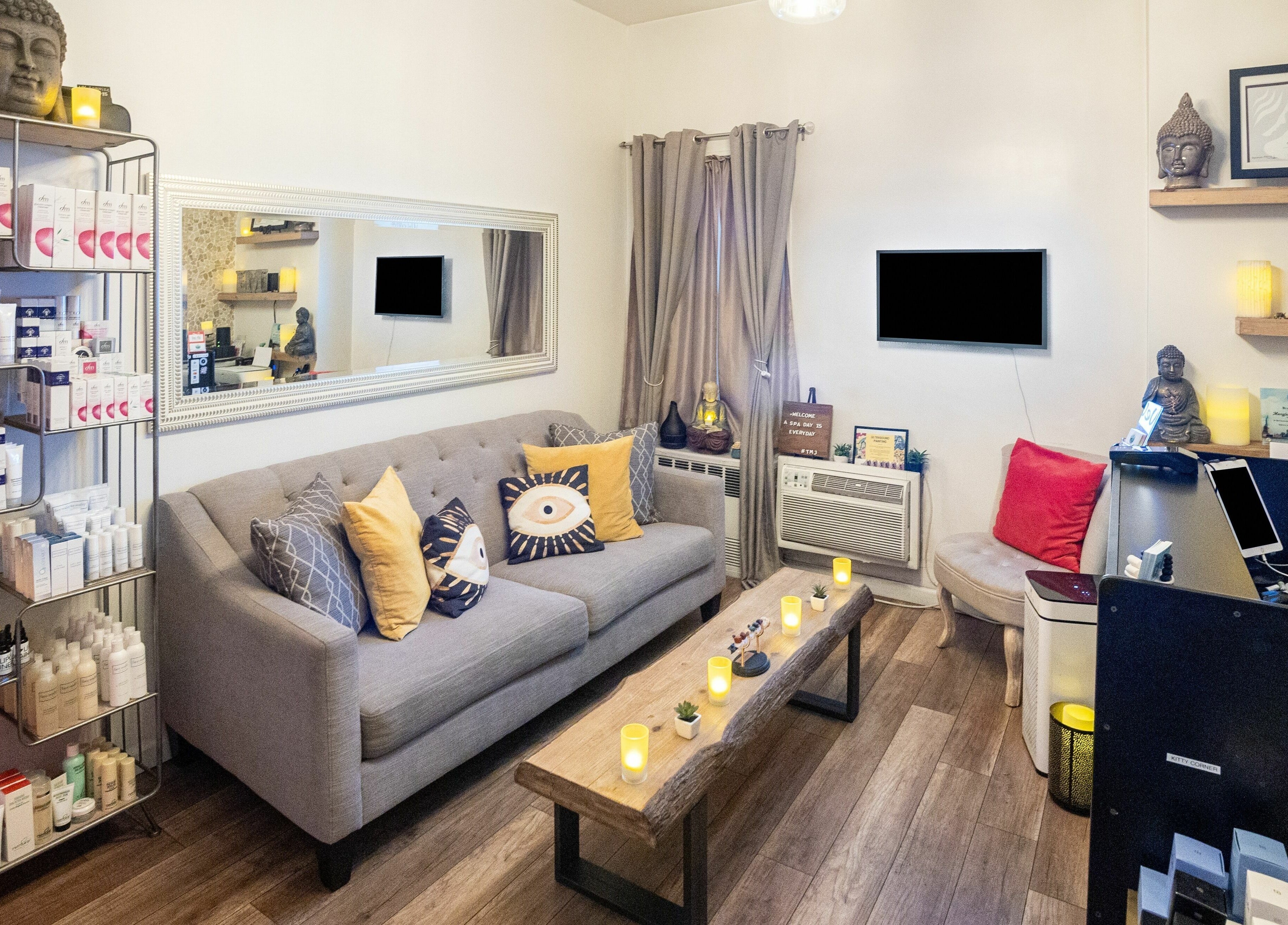 Relaxing interior of The MJ Treatment Spa and Wellness in New York, New York, US with cozy seating and soothing decor.