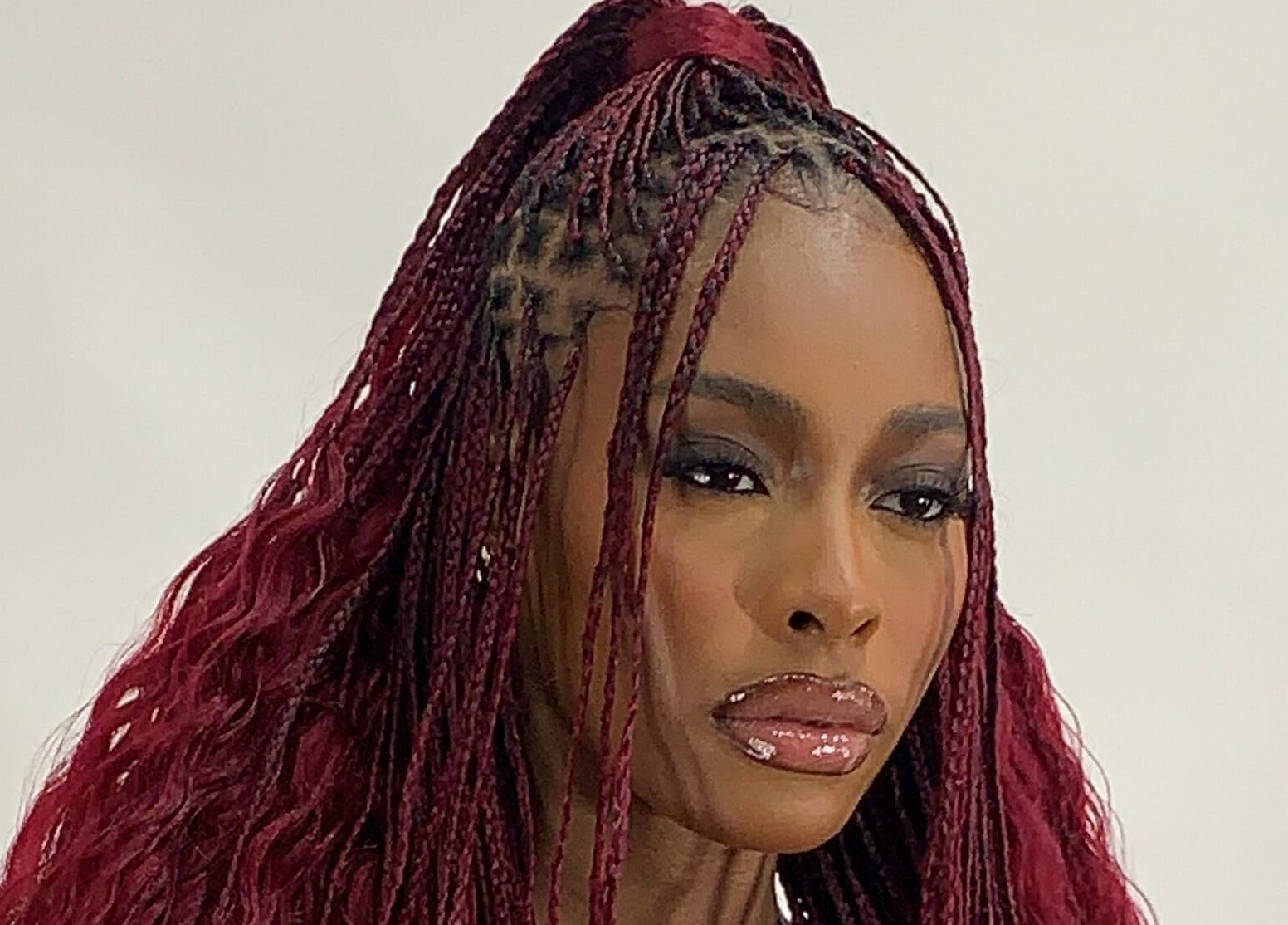 Elegant woman with braided hairstyle at Flawless Face by Jane, Lagos, Lagos, NG.