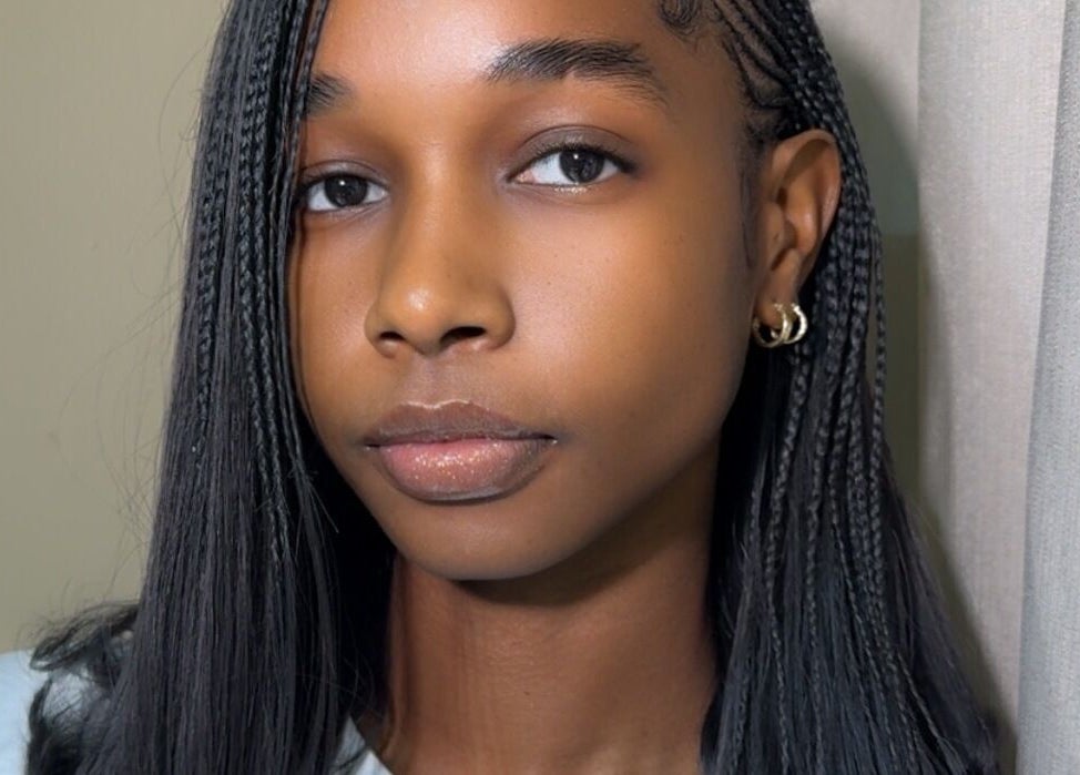 Close-up portrait showcasing flawless braided hairstyle at Flawless Face by Jane, Lagos, Lagos, NG.