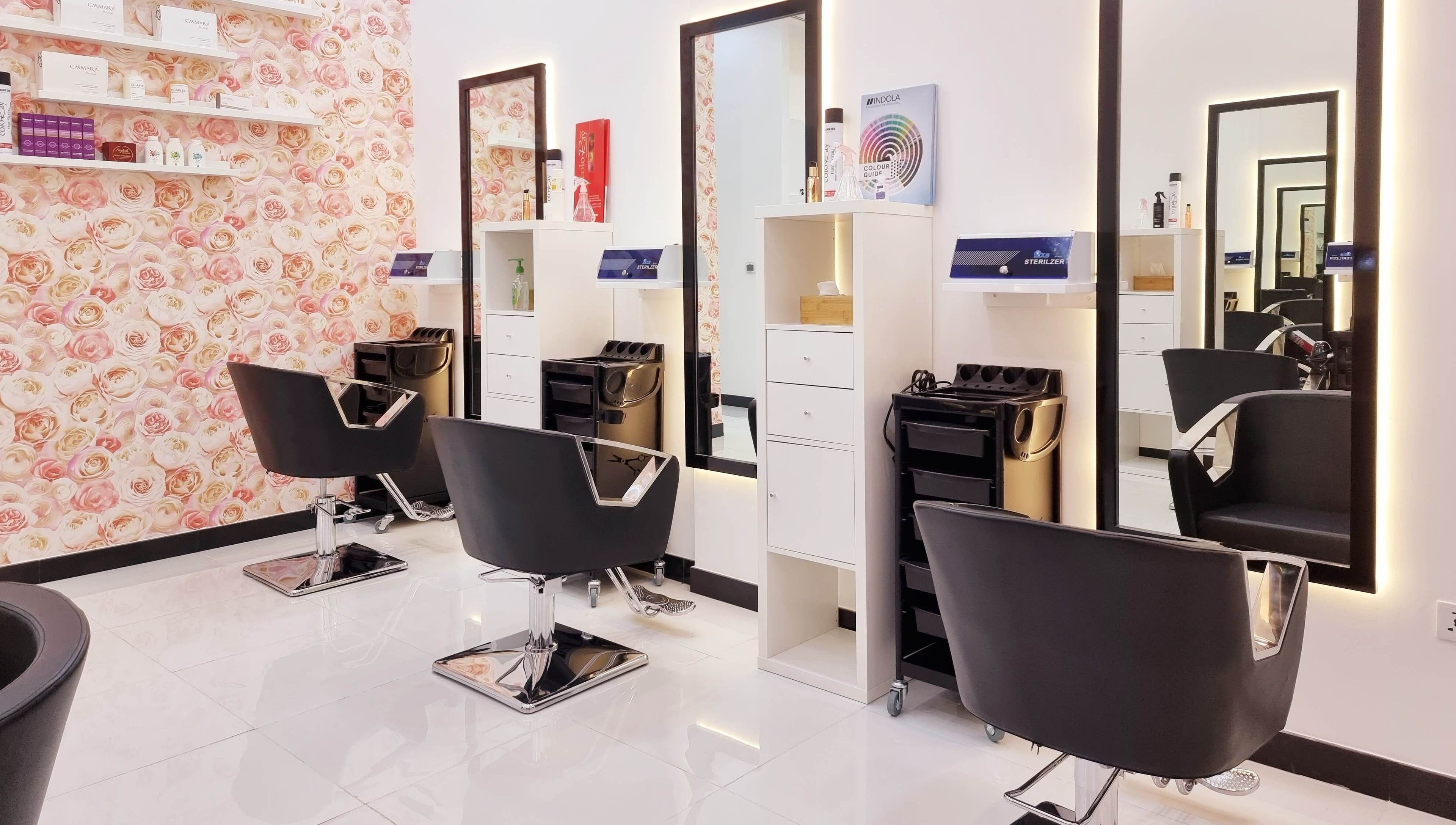 Modern salon interior with stylish chairs at Ombre Salon for Ladies LLC, Dubai, AE.