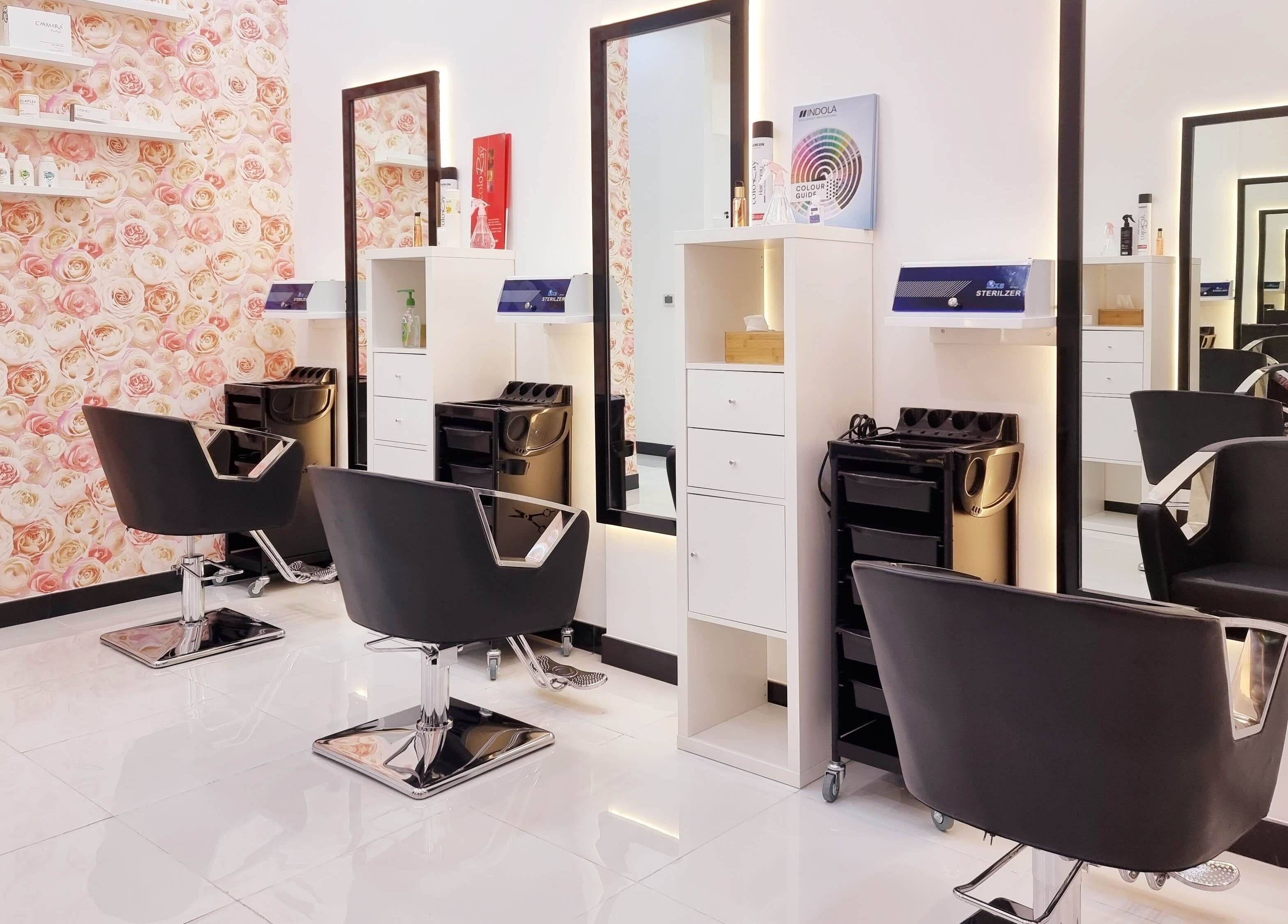 Modern salon interior with stylish chairs at Ombre Salon for Ladies LLC, Dubai, AE.