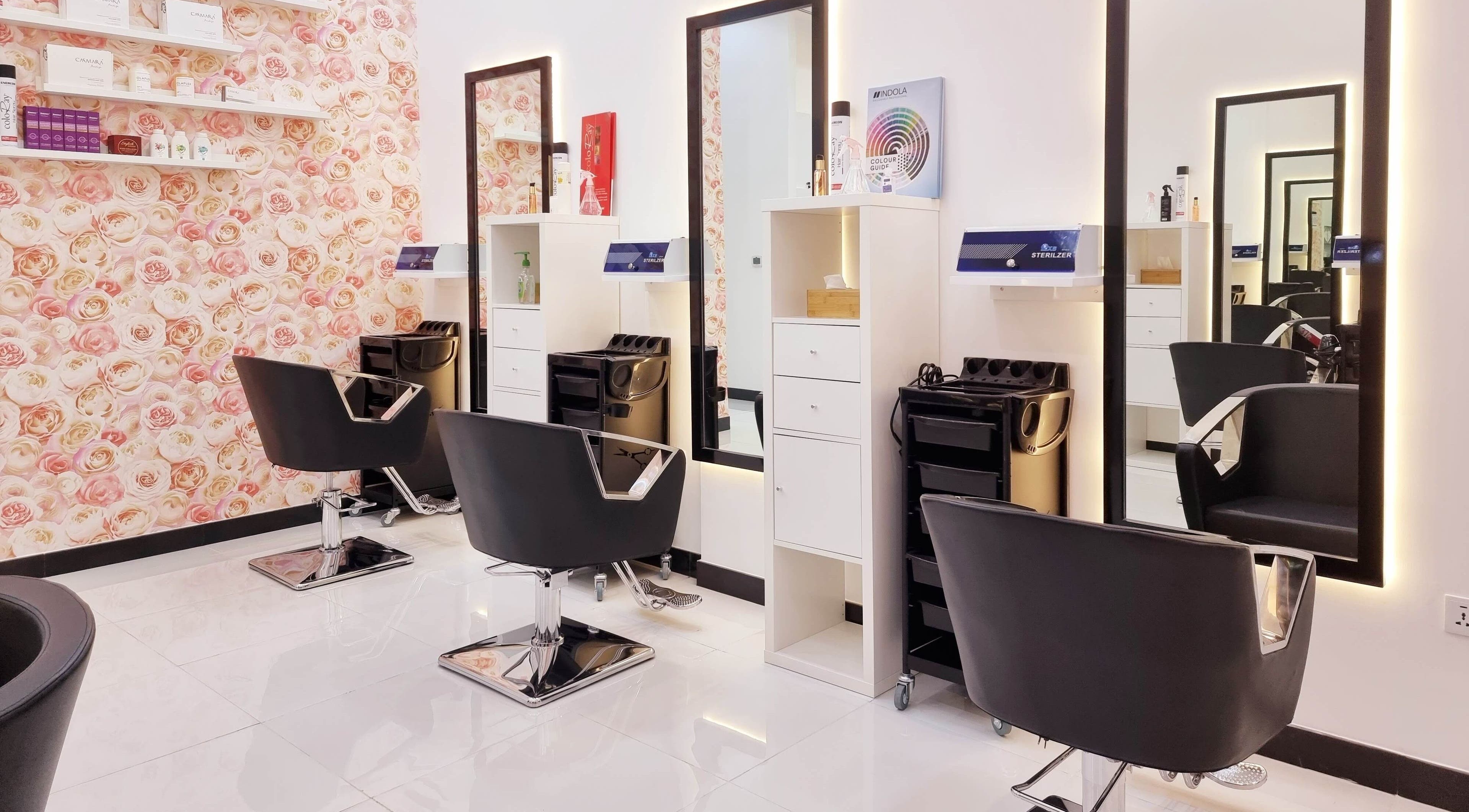 Modern salon interior with stylish chairs at Ombre Salon for Ladies LLC, Dubai, AE.