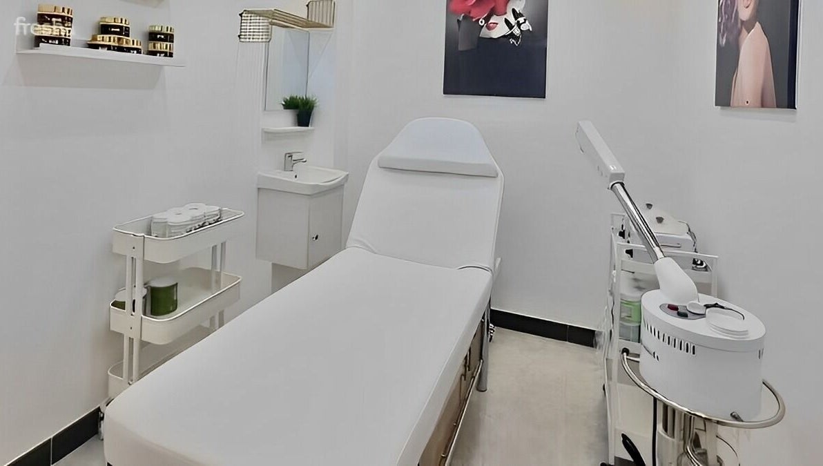 Serene treatment room at Ombre Salon FZE, Dubai, AE, with spa bed and modern equipment.
