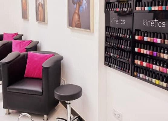 Stylish nail polish display and seating area at Ombre Salon for Ladies Branch, Dubai, Dubai, AE.