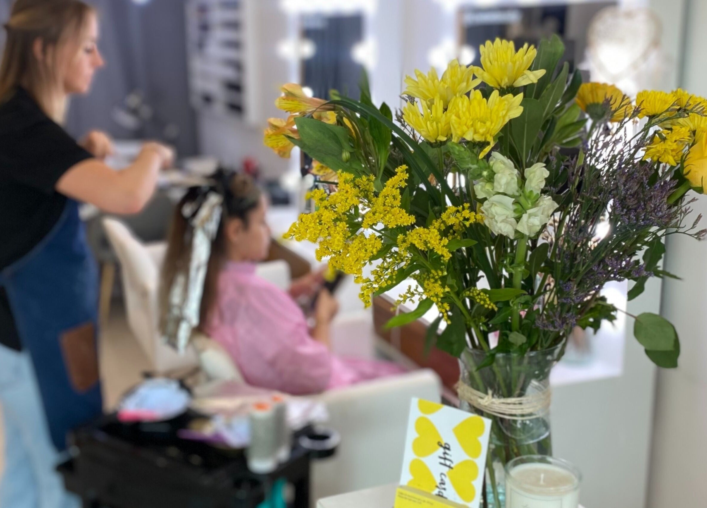 Floral arrangement beside hairstylist at Sukar, Playa del Carmen, Quintana Roo, MX.